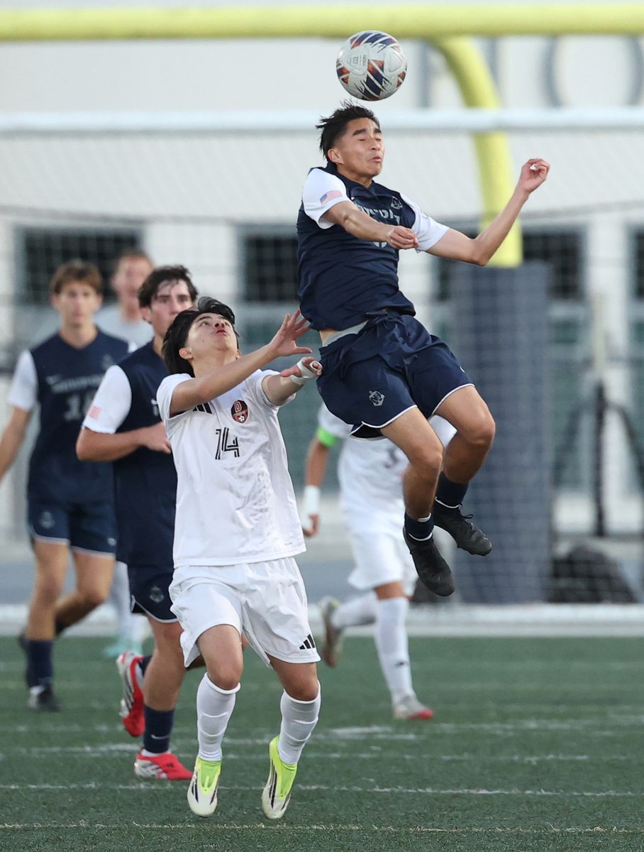 Newport Harbor heads the ball against Downey in the 2026 CIF semifinals.