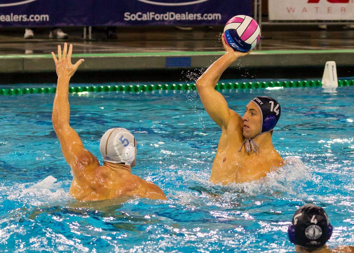 Newport Harbor player shooting over a defender.